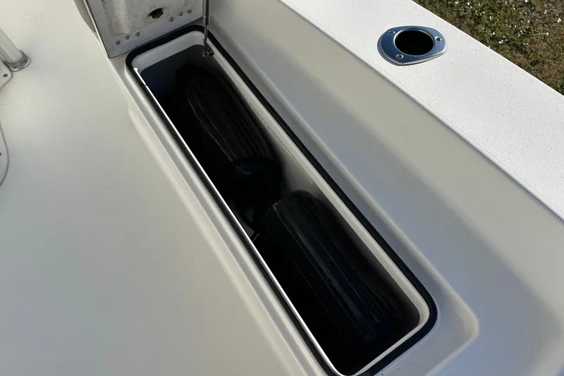 Slide: The Image of Storage compartment on 2020 Bay Rider 239 Bay boat, featuring sleek design and functionality. - 23