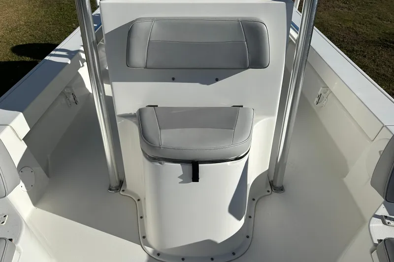 Slide: The Image of 2020 Bay Rider 239 Bay boat interior with cushioned seating and sleek design. - 25