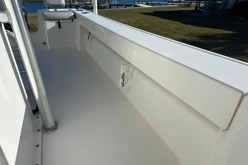 Slide: The Image of 2020 Bay Rider 239 Bay boat interior with seating and storage. - 28