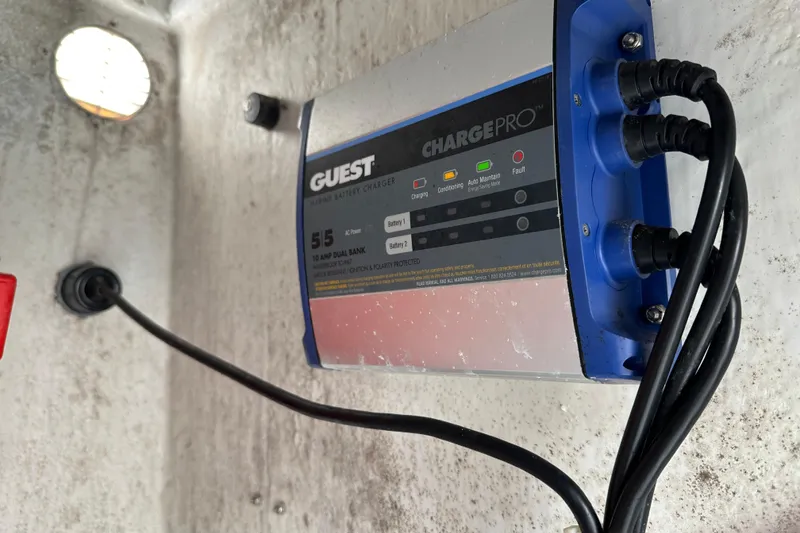 Slide: The Image of Marine battery charger in a 2020 Bay Rider 239 Bay boat. - 33