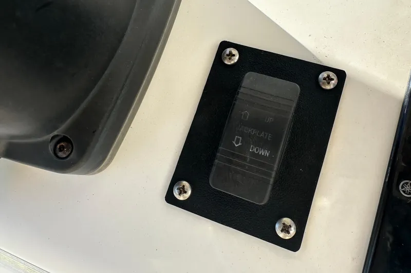 Slide: The Image of 2020 Bay Rider 239 Bay jackplate control switch on boat dashboard. - 41