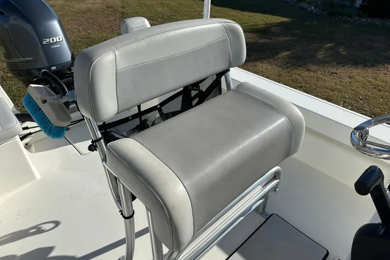 Slide: The Image of 2020 Bay Rider 239 Bay boat seat with Yamaha 200 engine in background. - 44
