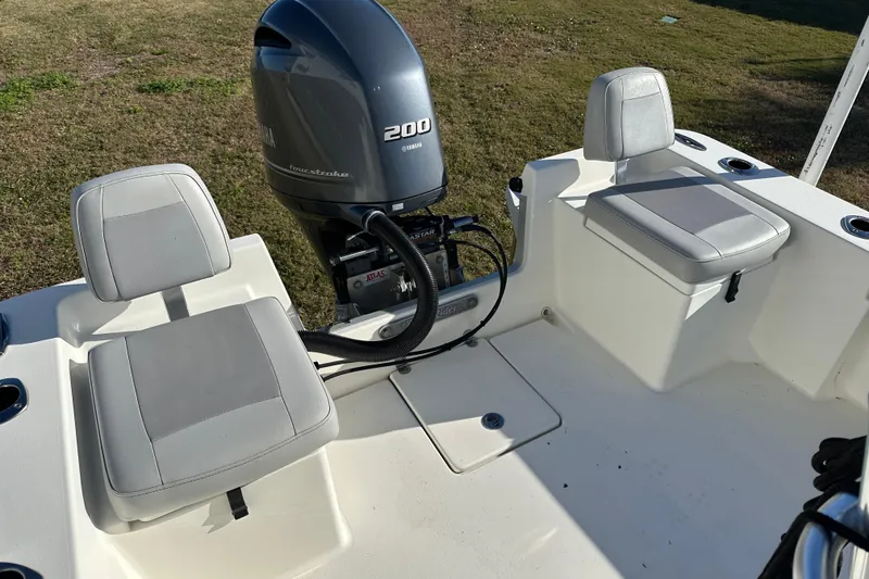 Slide: The Image of 2020 Bay Rider 239 Bay boat with Yamaha 200 engine and cushioned seating. - 45
