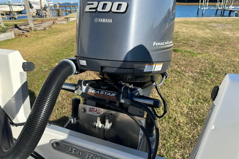 Slide: The Image of 2020 Bay Rider 239 Bay boat with Yamaha 200 outboard motor. - 48