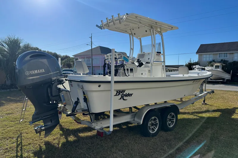 Slide: The Image of 2020 Bay Rider 239 Bay boat on trailer with Yamaha outboard motor. - 5