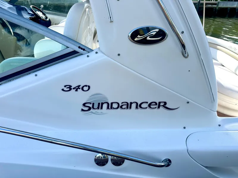 Slide: The Image of Close-up of 2008 Sea Ray 420 Sundancer boat with 'Sundancer 340' logo. - 41