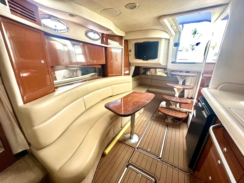 Slide: The Image of Luxurious 2008 Sea Ray 420 Sundancer interior with elegant seating and modern amenities. - 58
