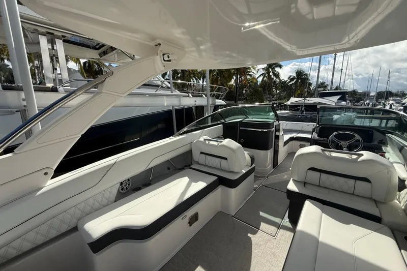 Slide: The Image of Luxurious 2022 Regal LX6 boat interior with plush seating and modern design. - 3