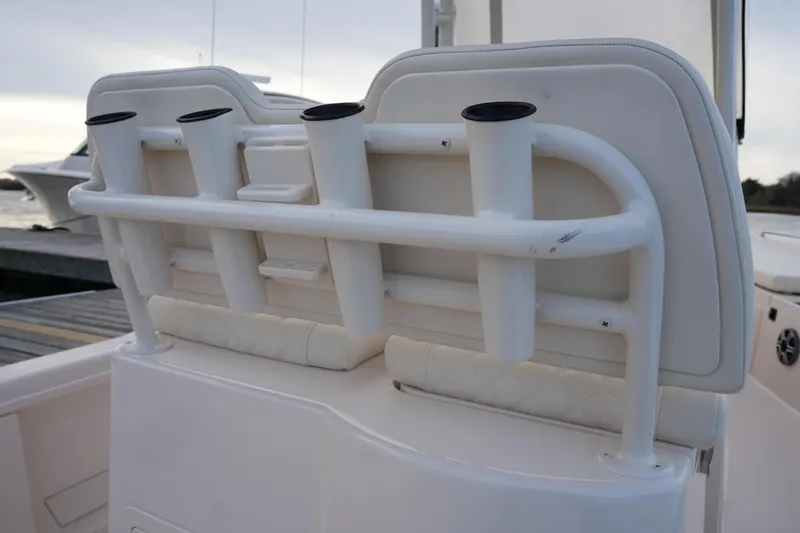 Slide: The Image of Rod holders on 2026 Grady-White 251 Coastal Explorer boat, docked at marina. - 23