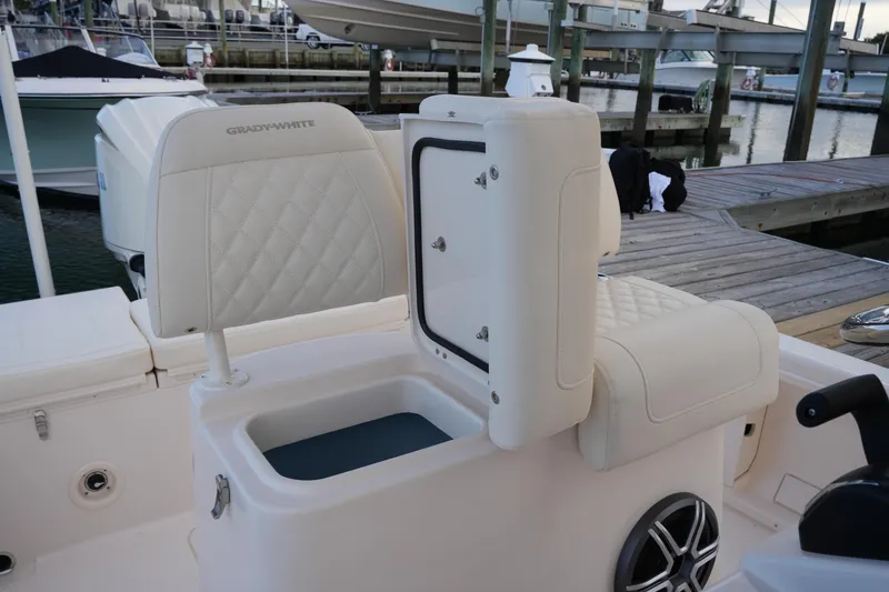 Slide: The Image of 2026 Grady-White 251 Coastal Explorer boat interior with open storage compartment. - 25