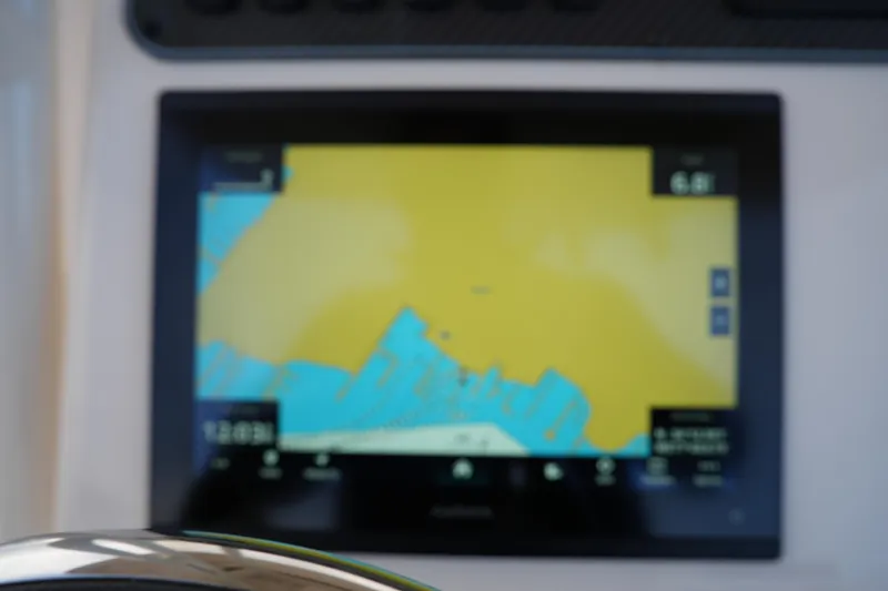 Slide: The Image of Navigation screen on 2026 Grady-White 251 Coastal Explorer boat dashboard. - 29