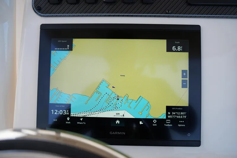 Slide: The Image of Garmin GPS display on 2026 Grady-White 251 Coastal Explorer boat dashboard. - 30