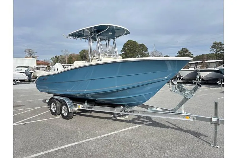 Slide: The Image of 2026 Bulls Bay 230 Center Console boat on trailer in parking lot. - 3