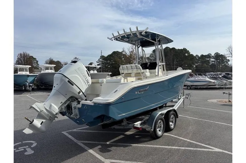 Slide: The Image of 2026 Bulls Bay 230 Center Console boat on trailer in parking lot. - 5