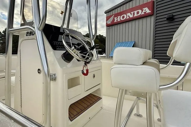 Slide: The Image of 2026 Bulls Bay 230 Center Console boat interior near Honda dealership. - 9