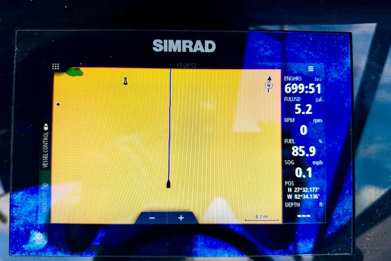 Slide: The Image of Simrad display on 2022 Sea Ray SPX 210 Outboard showing navigation and engine data. - 14