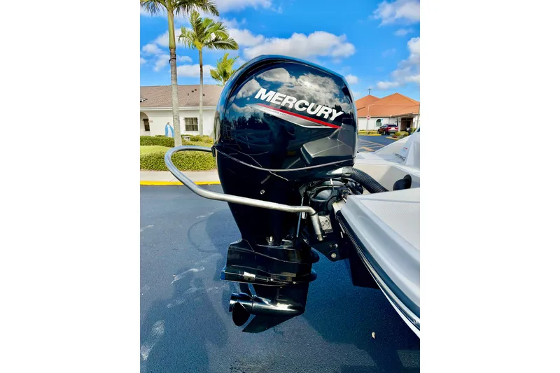 Slide: The Image of 2022 Sea Ray SPX 210 Outboard with Mercury engine, parked outdoors. - 28