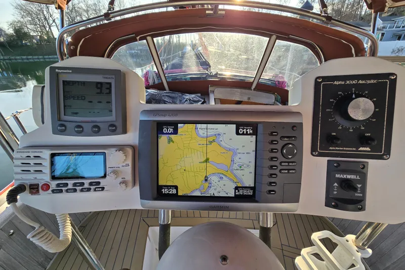 Slide: The Image of Cockpit of 1986 Hans Christian 38T sailboat with navigation instruments and GPS display. - 52