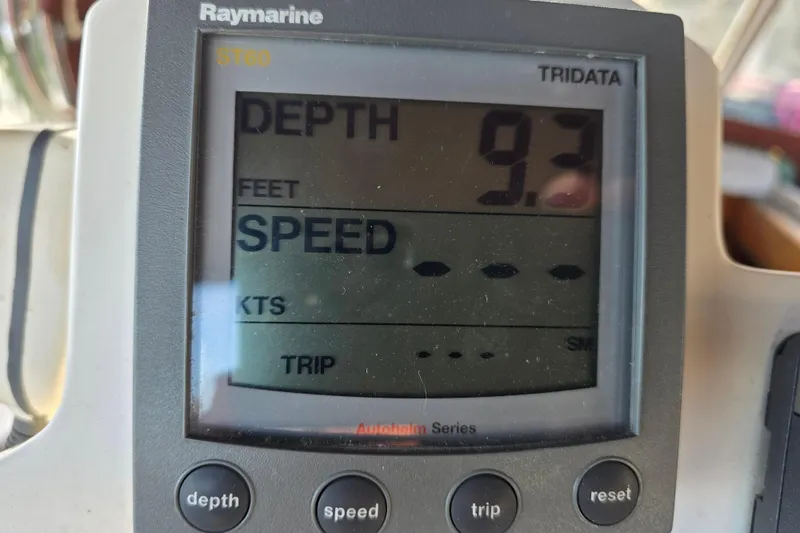 Slide: The Image of Raymarine ST60 Tridata display showing 9.3 feet depth on Hans Christian 38T, 1986 model. - 55