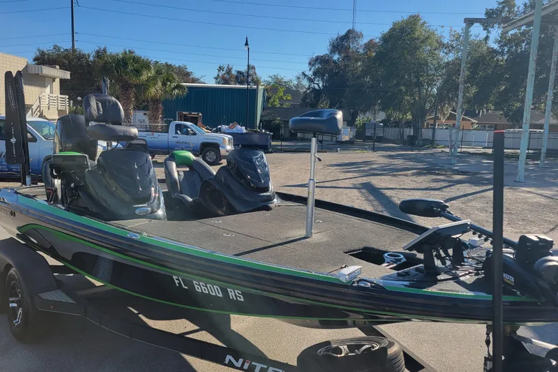 Slide: The Image of 2018 Nitro Z18 boat on trailer in outdoor setting, featuring sleek design and modern equipment. - 4