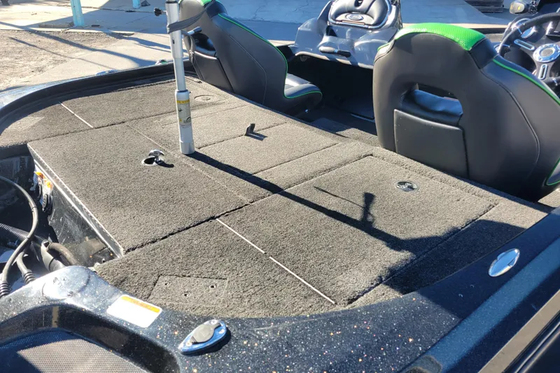 Slide: The Image of 2018 Nitro Z18 boat interior with carpeted deck and dual seats. - 6