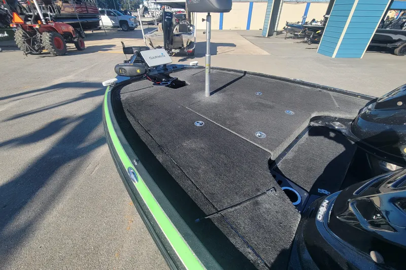 Slide: The Image of 2018 Nitro Z18 boat deck with Garmin equipment, parked outdoors. - 9