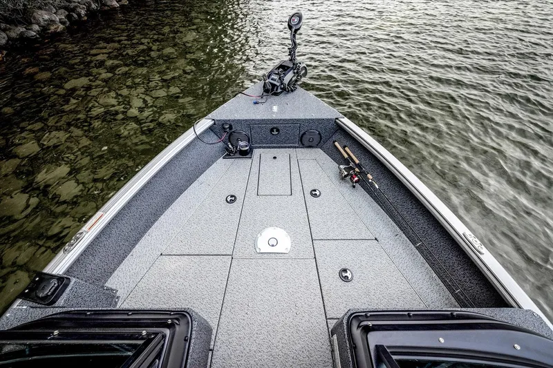 Slide: The Image of 2026 Lund 1775 Impact XS Sport boat on trailer, parked outdoors. - 3