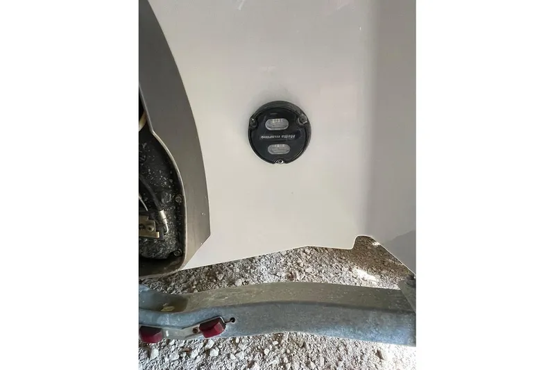 Slide: The Image of 2019 Regal 22 FasDeck boat on trailer in storage facility. - 11