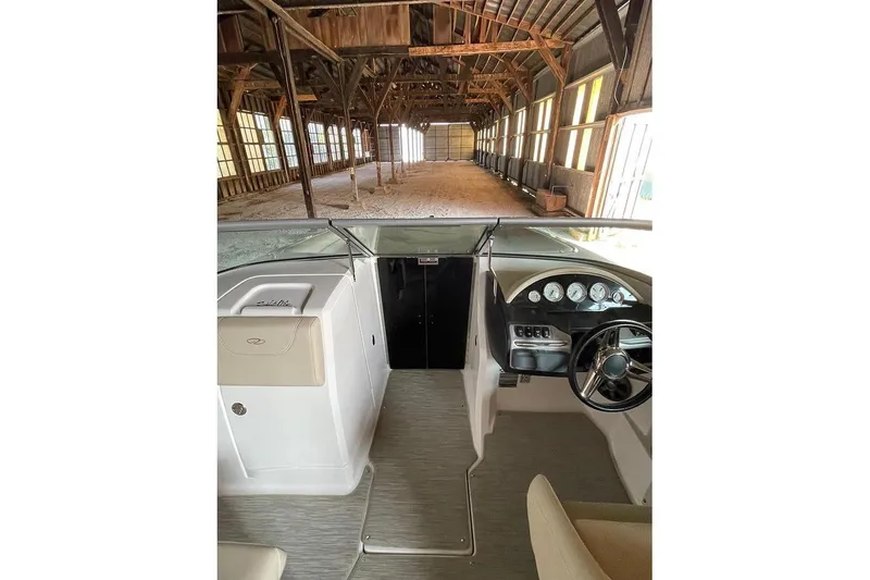 Slide: The Image of 2019 Regal 22 FasDeck control panel with switches for cockpit lights, tower, docking lights, and water pump. - 33