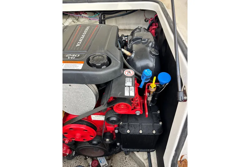 Slide: The Image of Engine compartment of 2019 Regal 22 FasDeck with Volvo Penta 240 V6 engine. - 54