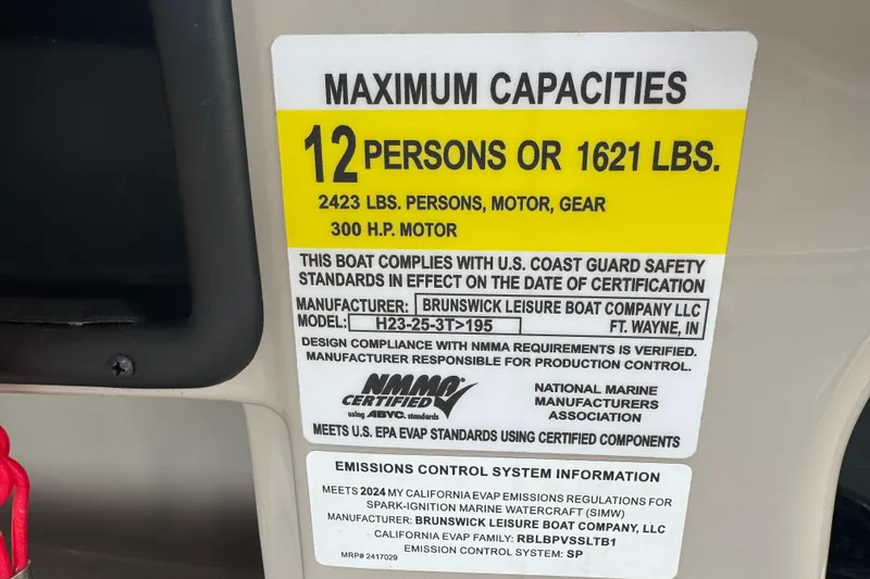 Slide: The Image of 2024 Harris Breeze 230 capacity label: 12 persons, 2423 lbs, 300 HP motor compliance. - 7