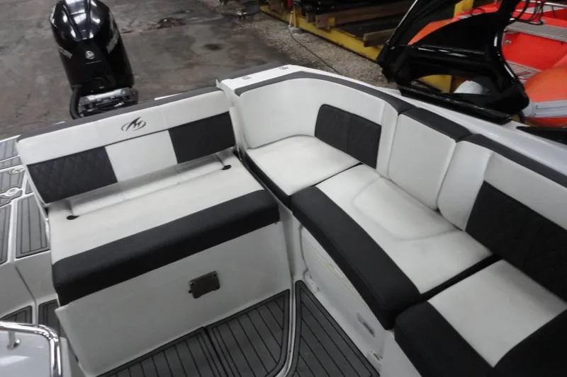 Slide: The Image of Luxurious 2021 Monterey M-65 boat interior with sleek seating and modern design. - 10
