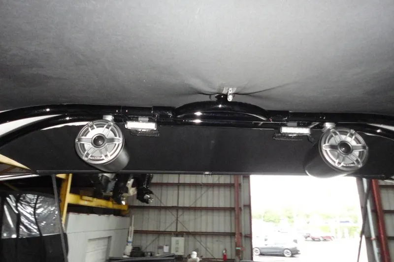 Slide: The Image of Dashboard of a 2021 Monterey M-65 boat with Raymarine display and control switches. - 20