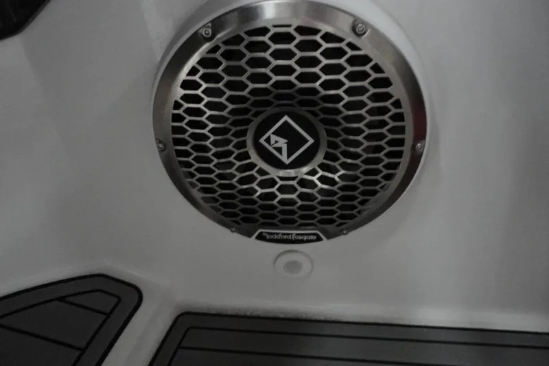 Slide: The Image of Interior of a 2021 Monterey M-65 boat, featuring sleek steering and modern controls. - 21