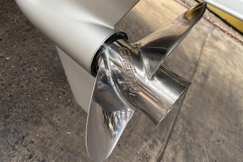 Slide: The Image of Close-up of a 2021 Monterey M-65 boat propeller on a concrete surface. - 36