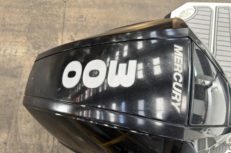 Slide: The Image of Mercury outboard motor on a 2021 Monterey M-65 boat, viewed from above. - 38