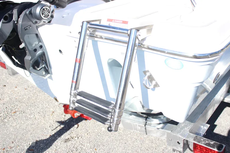 Slide: The Image of Rear view of 2026 Sea Fox 228 Traveler boat with stainless steel ladder. - 5