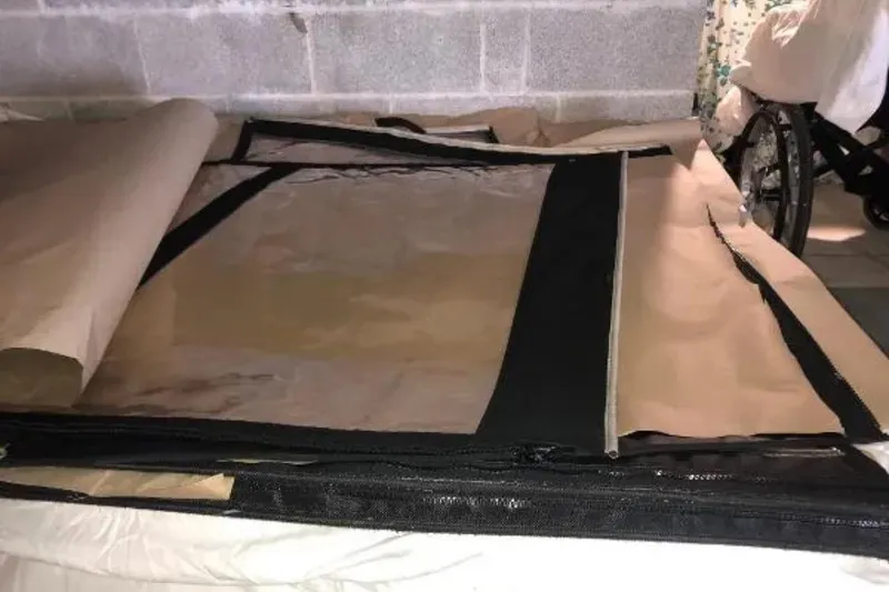 Slide: The Image of Protective cover for 2004 Century 3200 Center Console boat, stored indoors. - 57