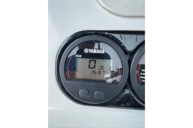 Slide: The Image of Yamaha tachometer on 2004 Century 3200 Center Console boat, displaying 0 RPM. - 58