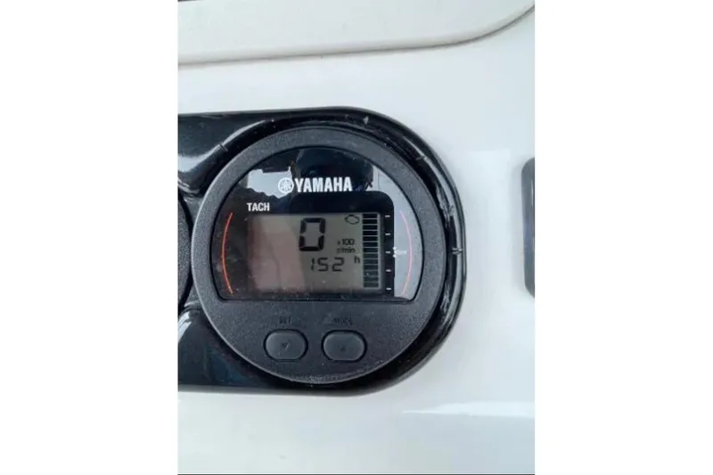 Slide: The Image of Yamaha tachometer display on 2004 Century 3200 Center Console boat dashboard. - 59