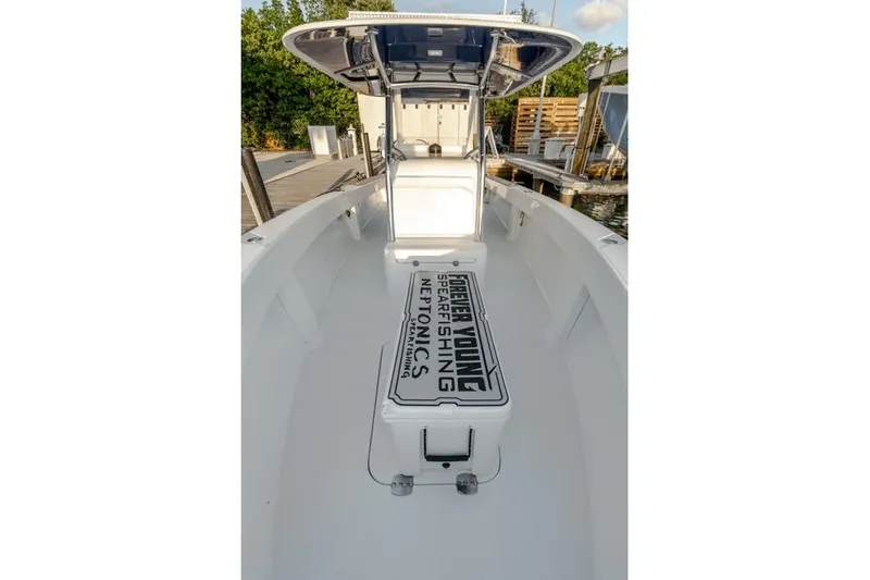 Slide: The Image of 2015 Bahama 34 boat interior with custom spearfishing equipment storage. - 28