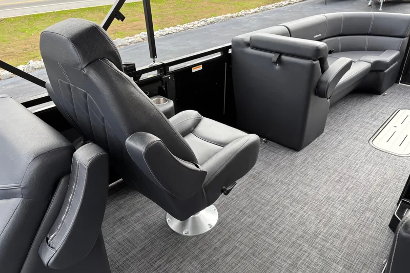 Slide: The Image of Luxurious interior of 2026 Veranda Vertex 235RC Premium pontoon boat with plush seating. - 10