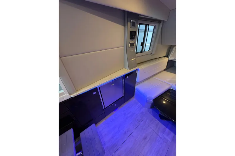 Slide: The Image of Interior of 2020 Formula 400 Super Sport Crossover with modern seating and ambient lighting. - 12