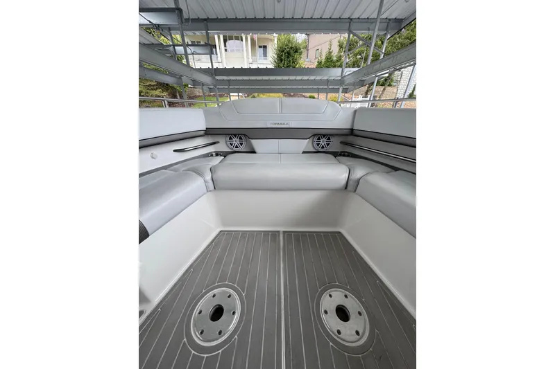 Slide: The Image of 2020 Formula 400 Super Sport Crossover boat interior with gray seating and flooring. - 22