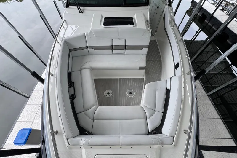 Slide: The Image of 2020 Formula 400 Super Sport Crossover boat interior with spacious seating area. - 23