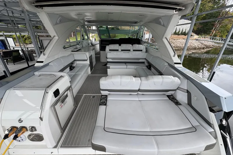 Slide: The Image of 2020 Formula 400 Super Sport Crossover boat interior with luxurious seating and modern amenities. - 26