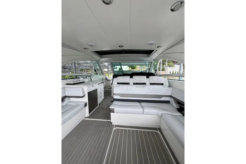 Slide: The Image of Luxurious interior of 2020 Formula 400 Super Sport Crossover boat with white seating. - 31