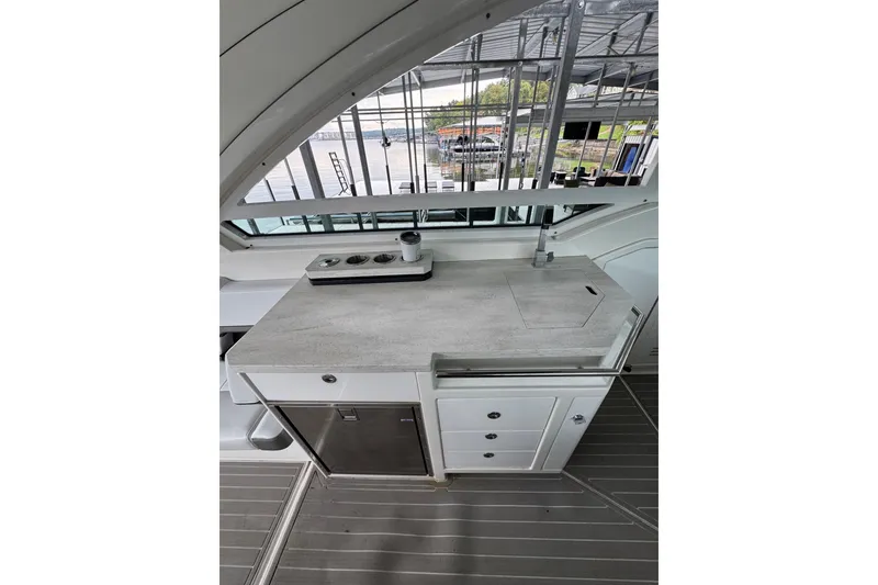 Slide: The Image of 2020 Formula 400 Super Sport Crossover yacht kitchen area with modern countertop and appliances. - 40