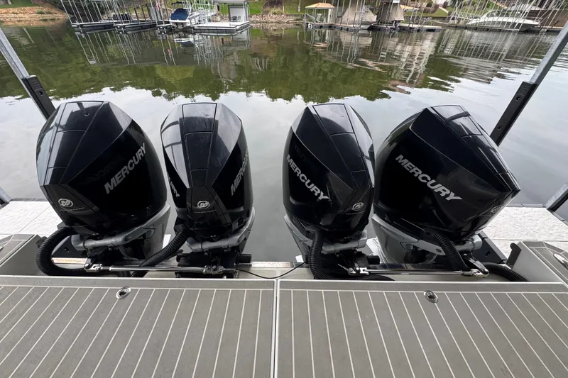 Slide: The Image of Four Mercury outboard engines on a 2020 Formula 400 Super Sport Crossover boat. - 43