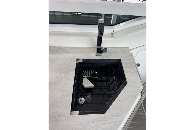 Slide: The Image of 2020 Formula 400 Super Sport Crossover yacht sink with modern faucet and countertop. - 45